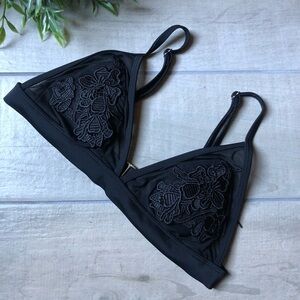 Xhilaration Lace appliqué mesh bikini top in black. Size M
